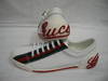 Given a pair of Gucci sneakers