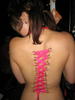 a pretty pink corset piercing :)