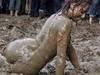 Naked mud wrestling