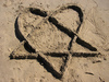 Heartagram in the sand
