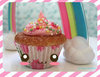 rainbow and delicious cupcake